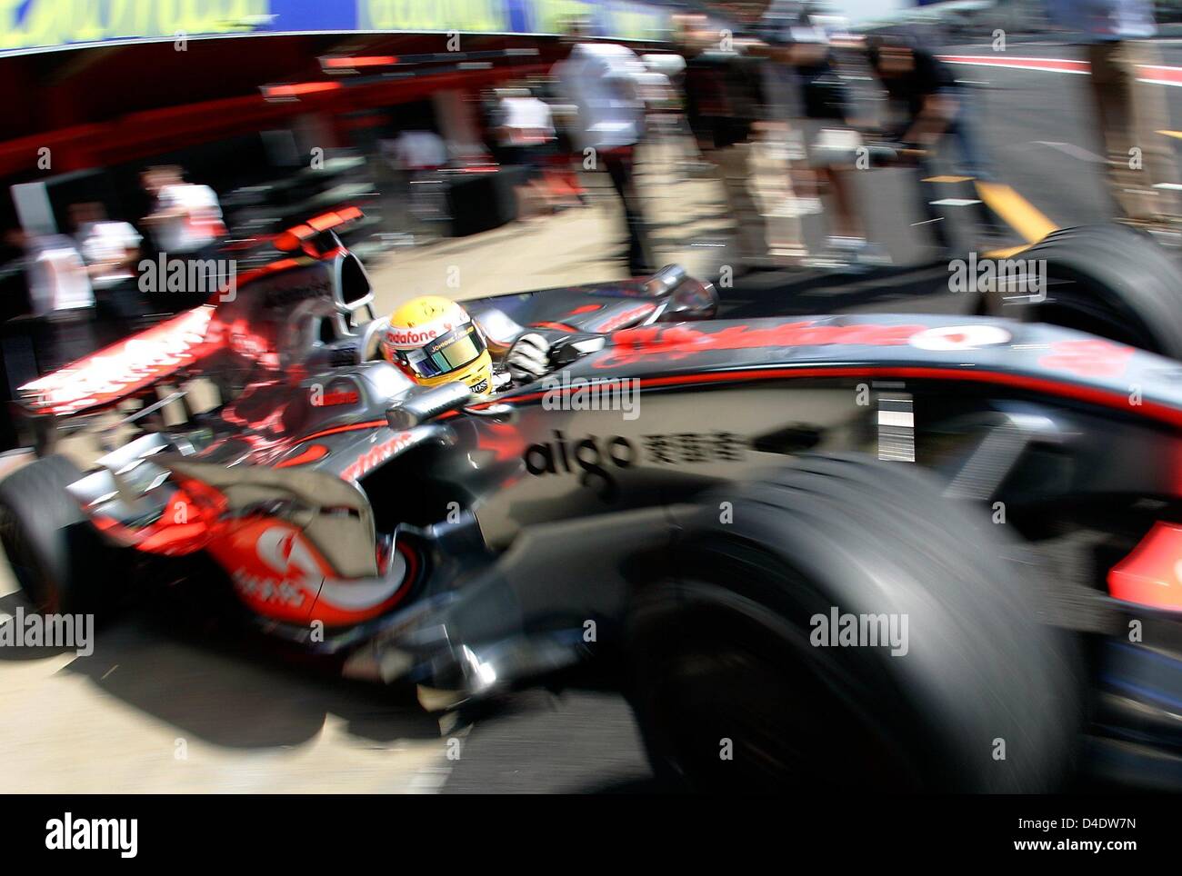 British Formula One driver Lewis Hamilton of McLaren Mercedes steers his car out the pits during the first practice session at Circuit de Catalunya in Montmelo near Barcelona, Spain, 24 April 2008. The Formula 1 Grand Prix of Spain be held here on 27 April. Photo: Felix Heyder Stock Photo