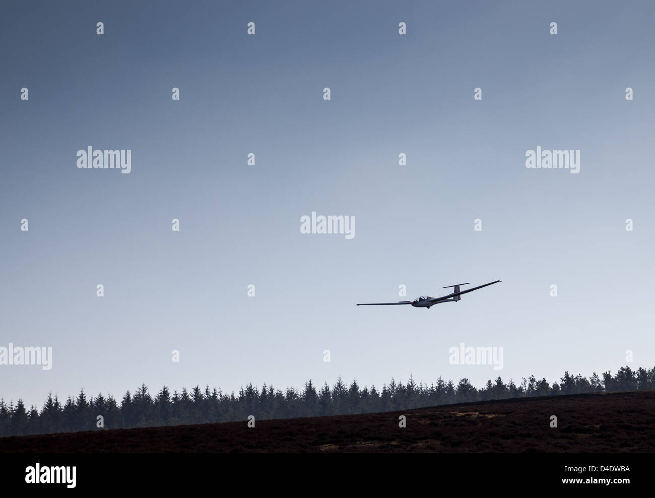 Glider in the sky above the Midland Gliding Club on the Long Mynd, near