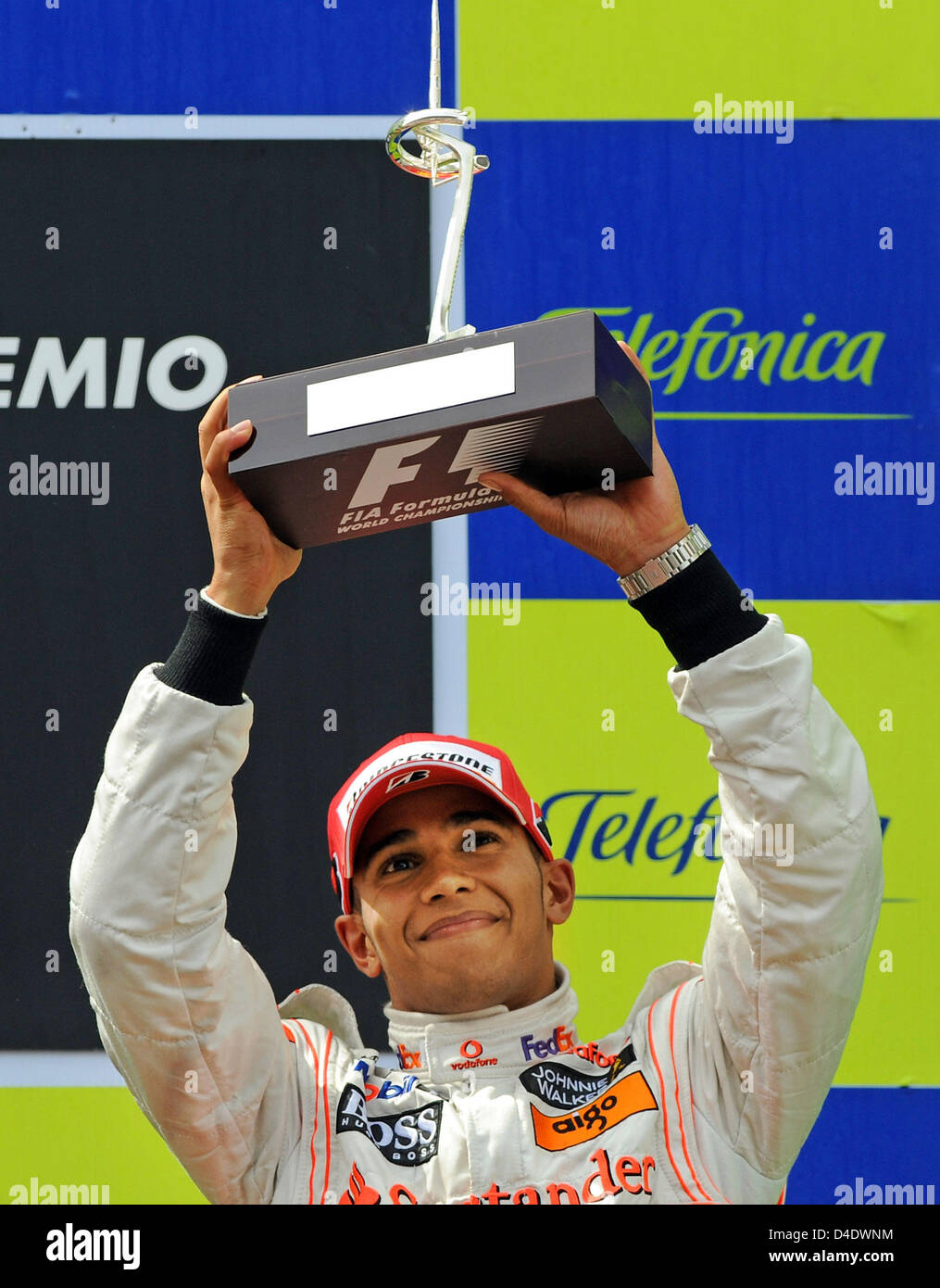 British Formula One driver Lewis Hamilton of McLaren Mercedes lifts his trophy to celebrate the third place in the Formula 1 Grand Prix of Spain at Circuit de Catalunya in Montmelo near Barcelona, Spain, 27 April 2008. Photo: GERO BRELOER Stock Photo