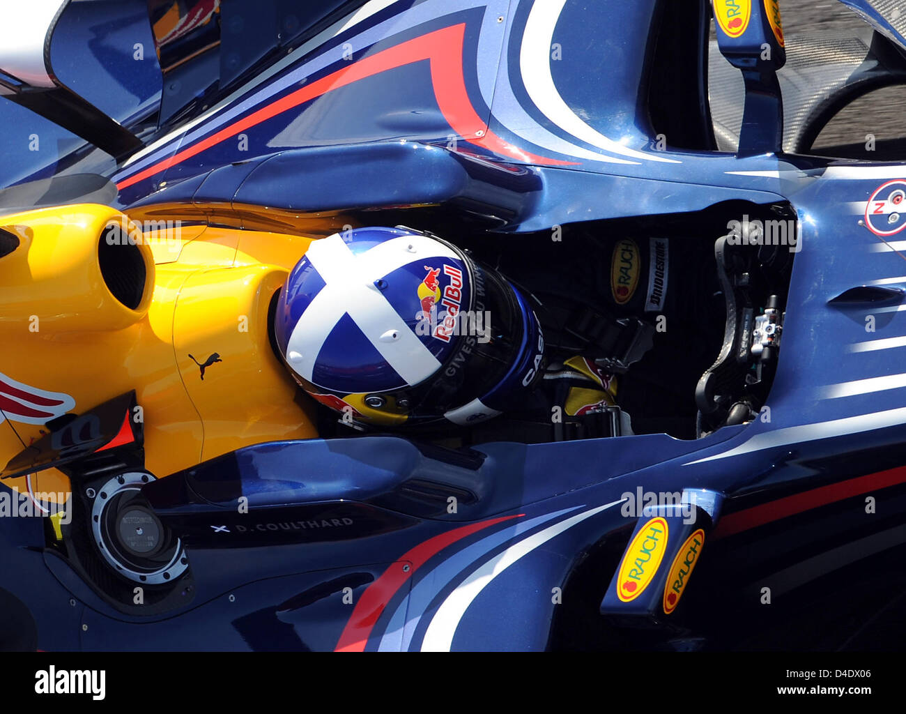 Scottish Formula One driver David Coulthard of Red Bull Racing steers his car trough the pit lane during the first practice session at Circuit de Catalunya in Montmelo near Barcelona, Spain, 25 April 2008. Photo: GERO BRELOER Stock Photo