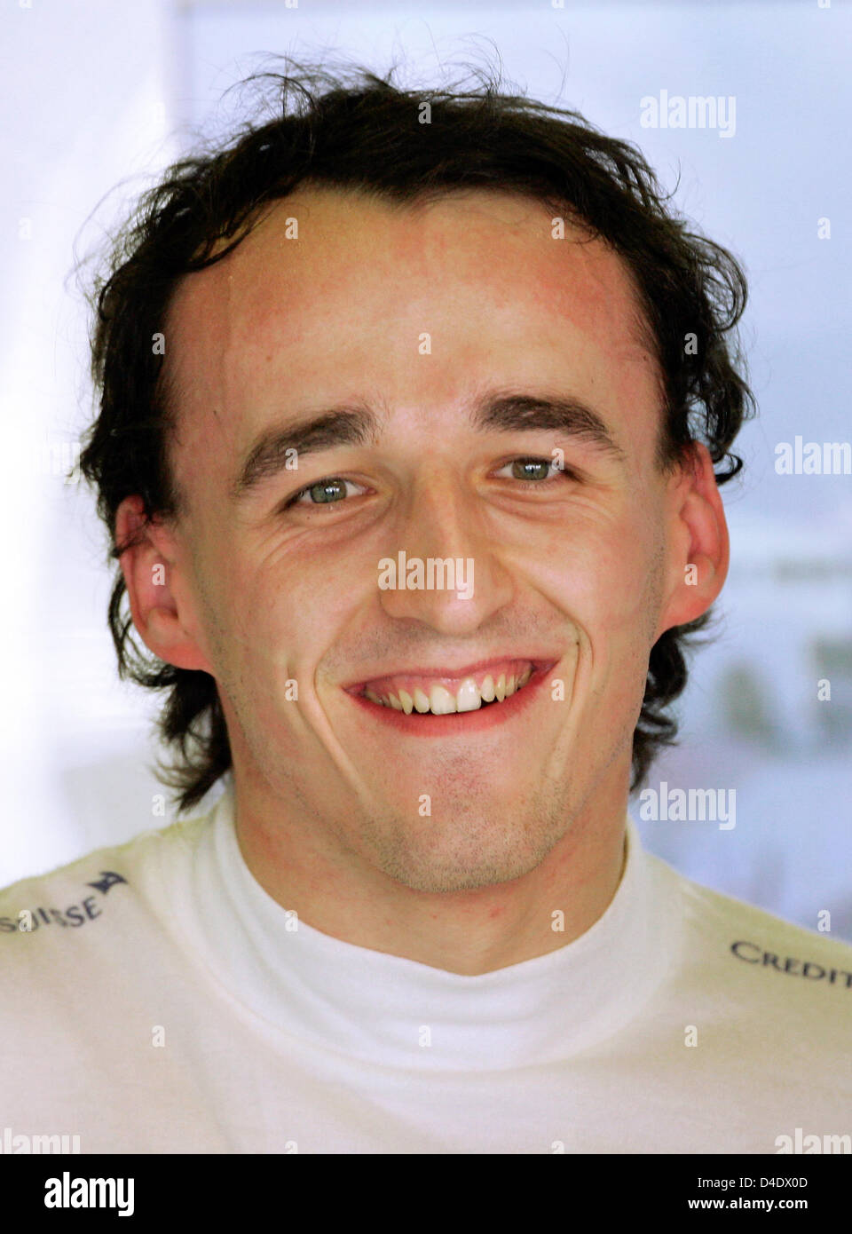 Polish Formula One driver Robert Kubica of BMW Sauber smiles during the