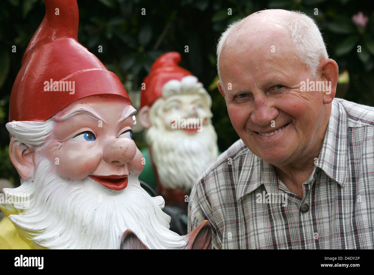 Fritz Luehken Poses Next To One Of His Largest Garden Gnomes In