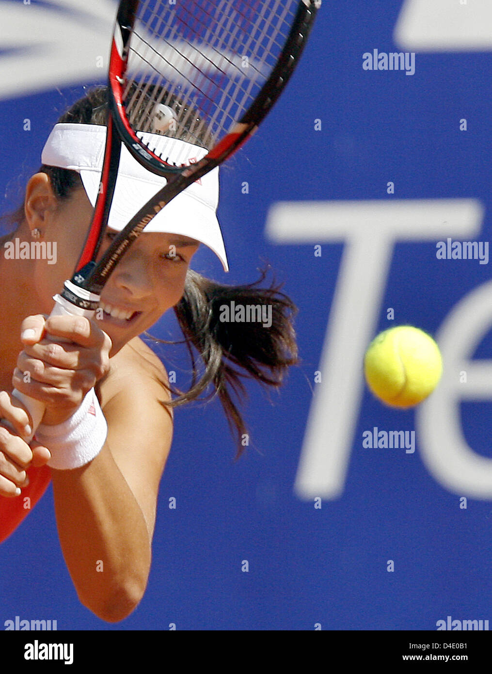 Ana Ivanovic of Serbia returns a backhand to Agnes Szavay of Hungary in their WTA German Open quarter-finals match in Berlin, Germany, 09 May 2008. Ivanovic defeated Szavay 3-6, 6-4, 6-3. Photo: Wolfgang Kumm Stock Photo
