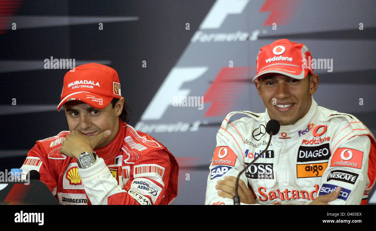 Brazilian Formula One driver Felipe Massa of Scuderia Ferrari (L), and British Fomula One driver Lewis Hamilton of McLaren Mercedes (R) attend the press conference after the Qualifying to the 2008 Formula 1 Turkish Grand Prix at Istanbul Park circuit in Istanbul, Turkey, 10 May 2008. Massa will start from pole position ahead of McLaren Mercedes's Finnish Formula One driver Heikki K Stock Photo