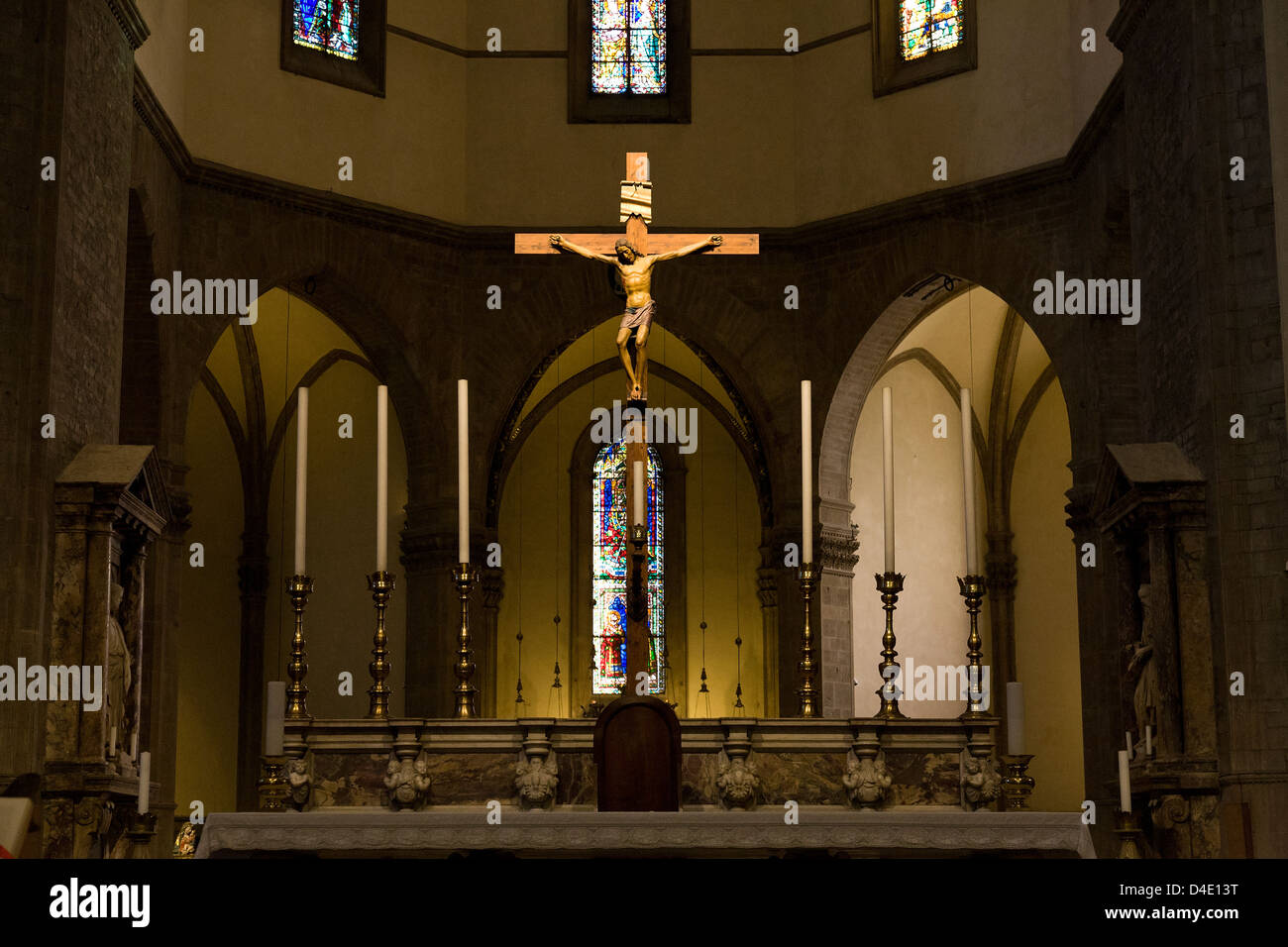 Interior of the Duomo, Santa Maria del Fiore Florence, Italy.The altar and cross with six candles. Stock Photo