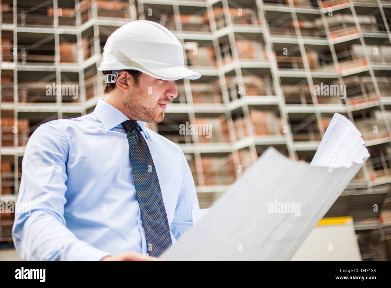 Portrait of an architect in front of a construction site Stock Photo