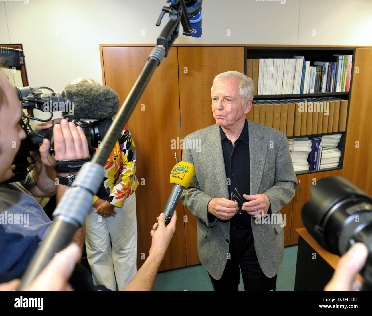 German cancer researcher Harald zur Hausen gives an interview in his office at Deutsches