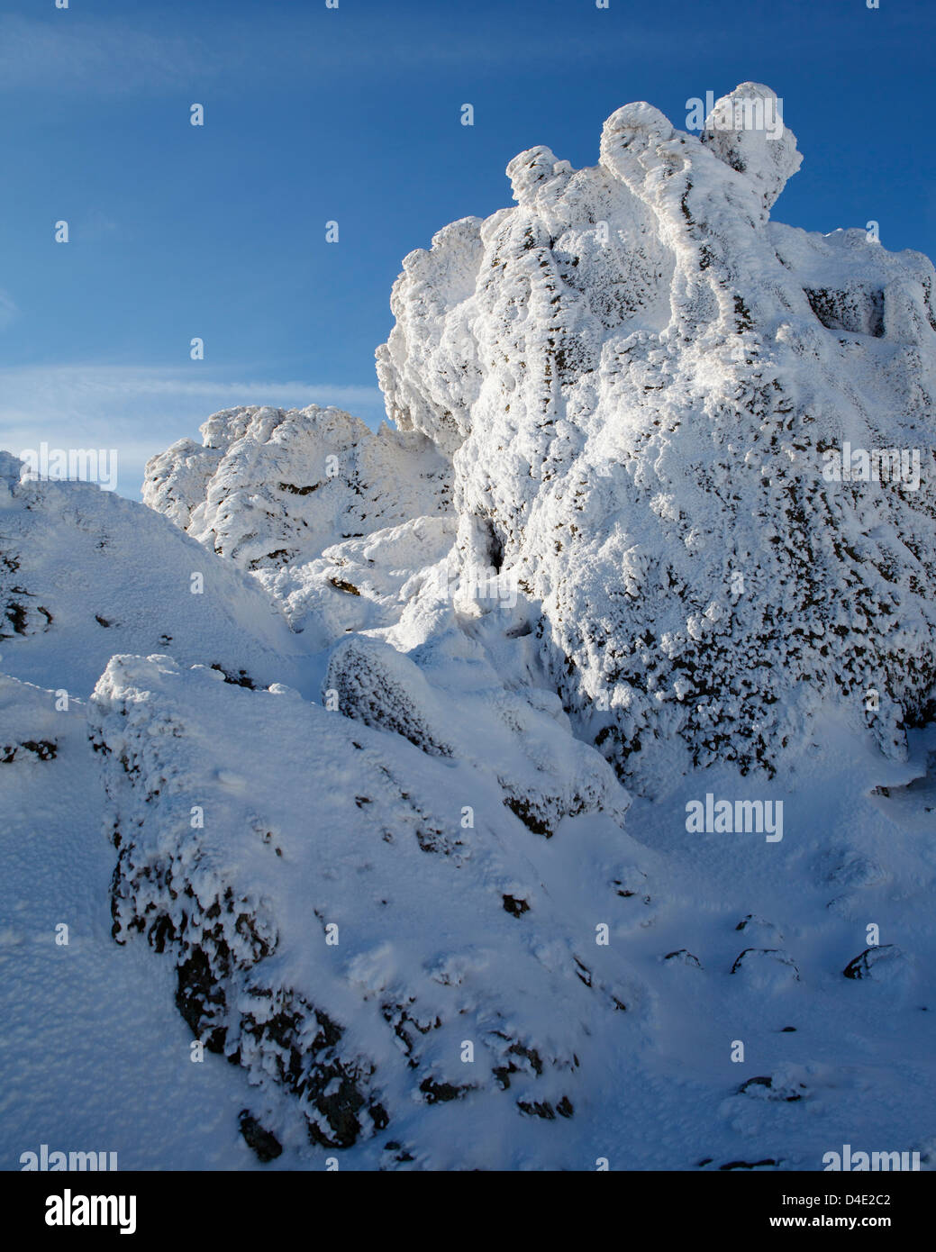 Snow Covered rock formation, Glyderau Range, Snowdonia National Park Stock Photo