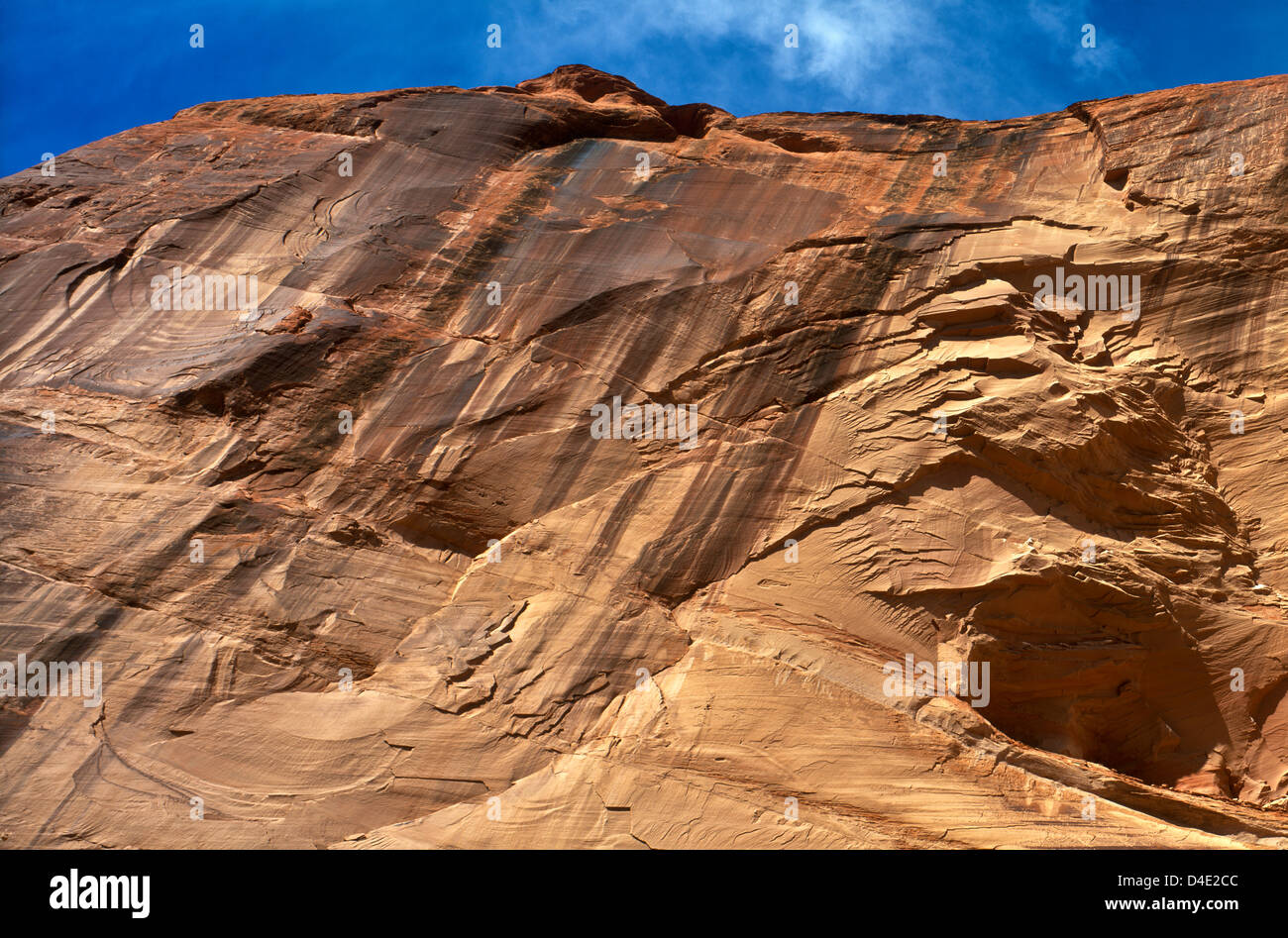 Canyon Varnish on huge cliff, Canyon De Chelly, Arizona. Navajo Nation, Apache County. USA. Stock Photo
