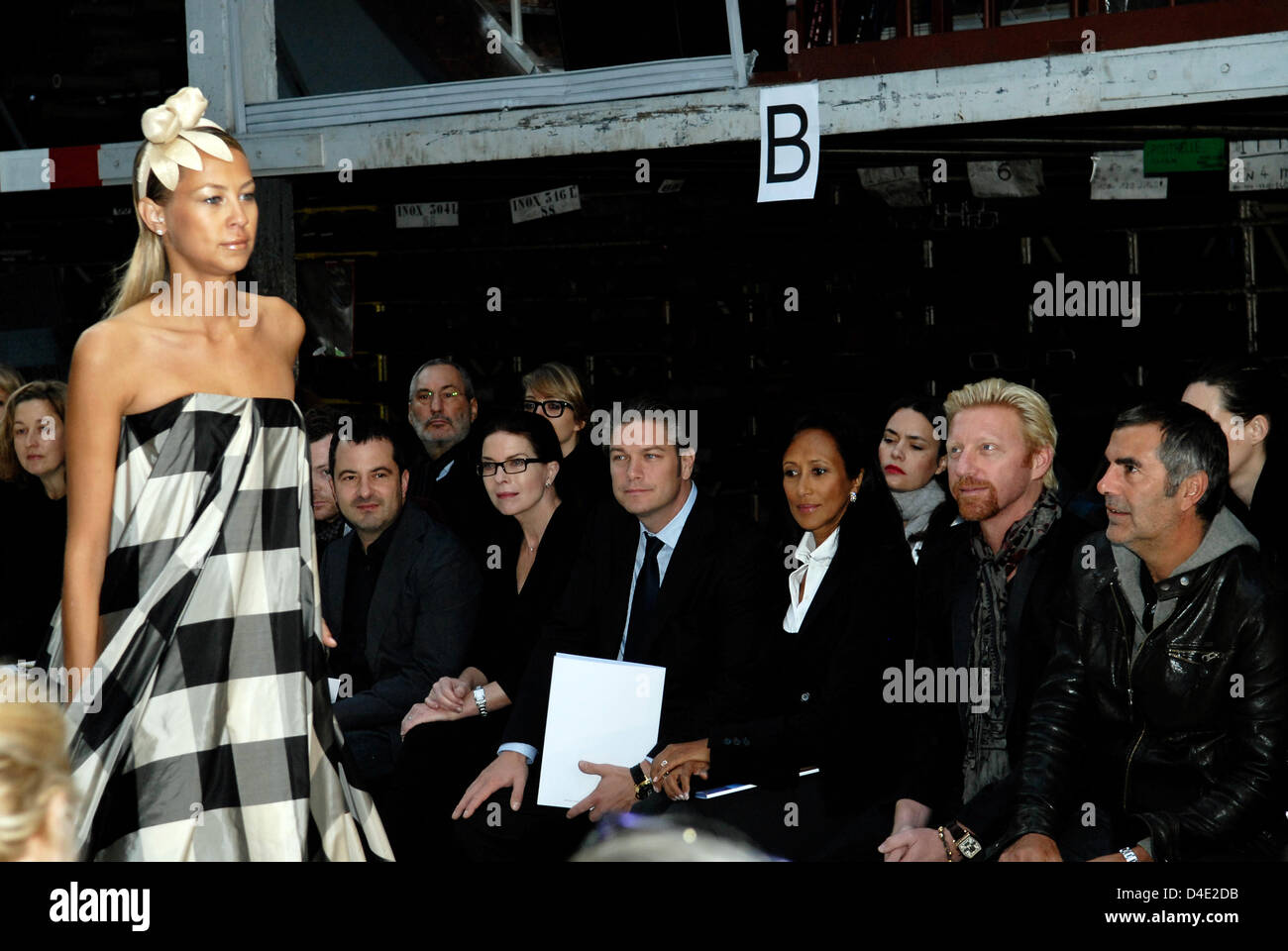 Designer Sandy Meyer-Woelden displays a creation by German designers Johnny Talbot and Adrian Runhof for their spring-summer-2009-ready-to-wear-collection show in Paris, France, 5 October 2008. Front row:  Actress Gudrun Landgrebe (C, with glasses), Boris Becker (2-R) and Norbert Medus (R). Photo: ImaxTREE Stock Photo