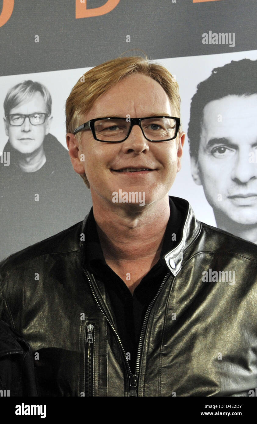 Band member of Depeche Mode, Andrew Fletcher, poses for photographers