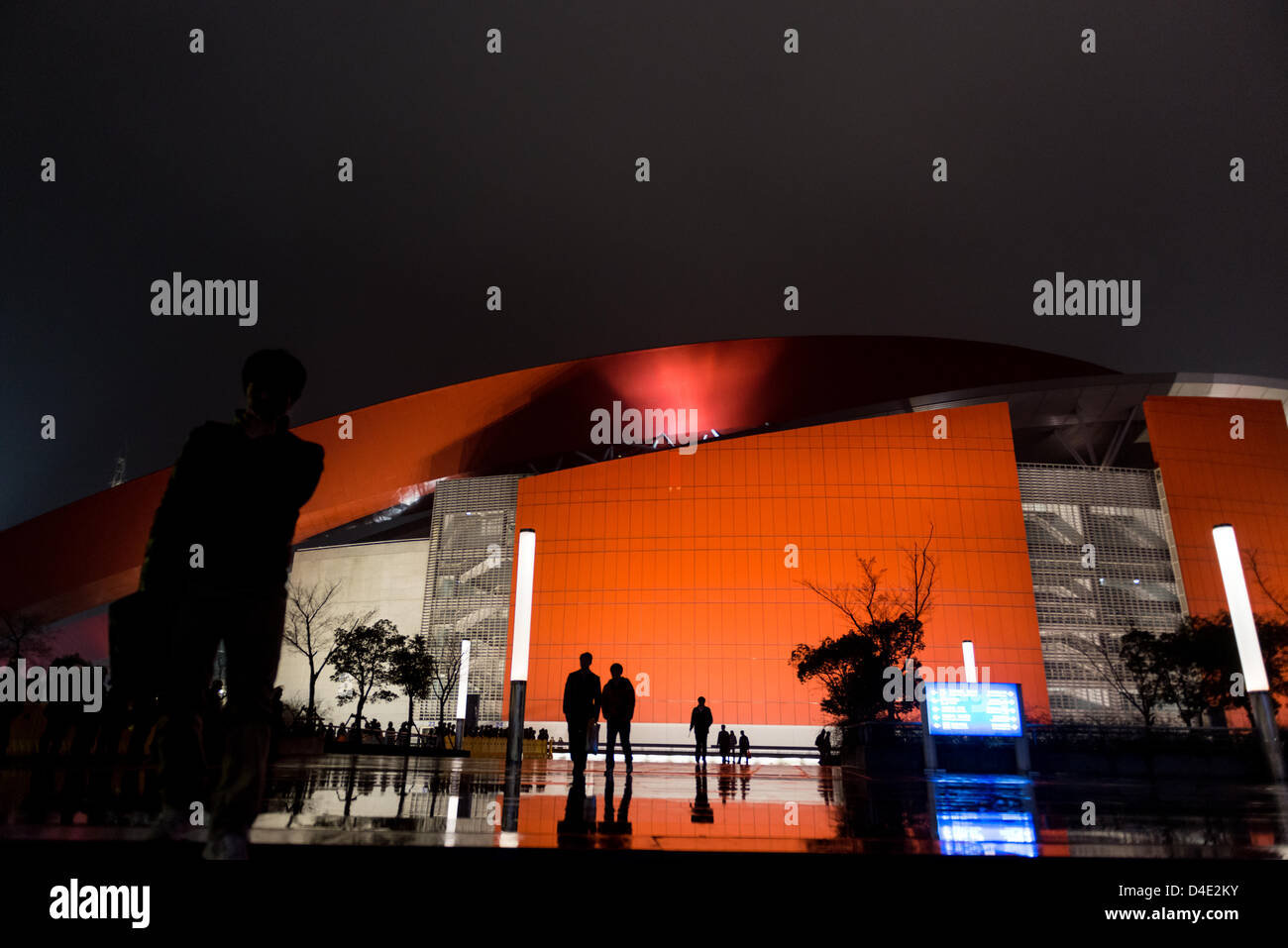 Visitors leaving the stadium of the Nanjing Olympic Sports Center after a football match of Jiangsu Sainty FC. Stock Photo