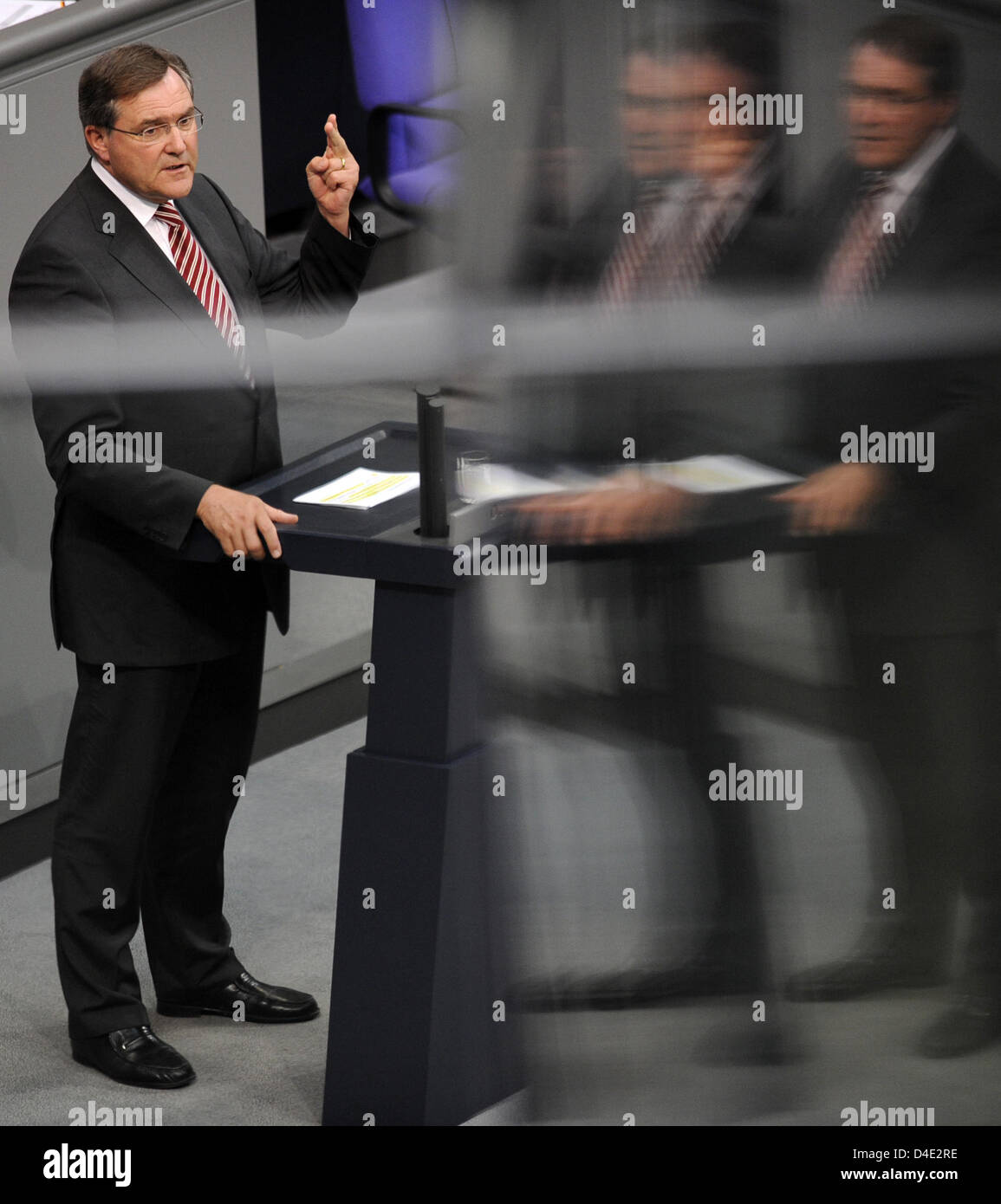 German Defence Minister Franz Josef Jung addresses the parliament during a special hearing of the German Bundestag in Berlin, Germany, 07 October 2008. German federal cabinet has agreed on the 14-month-extention of the Afghanistan mandate and an additional deployment of 1,000 soldiers, then numbering 4,500 in total. The decision has yet to be ratified by the German Bundestag. Photo Stock Photo