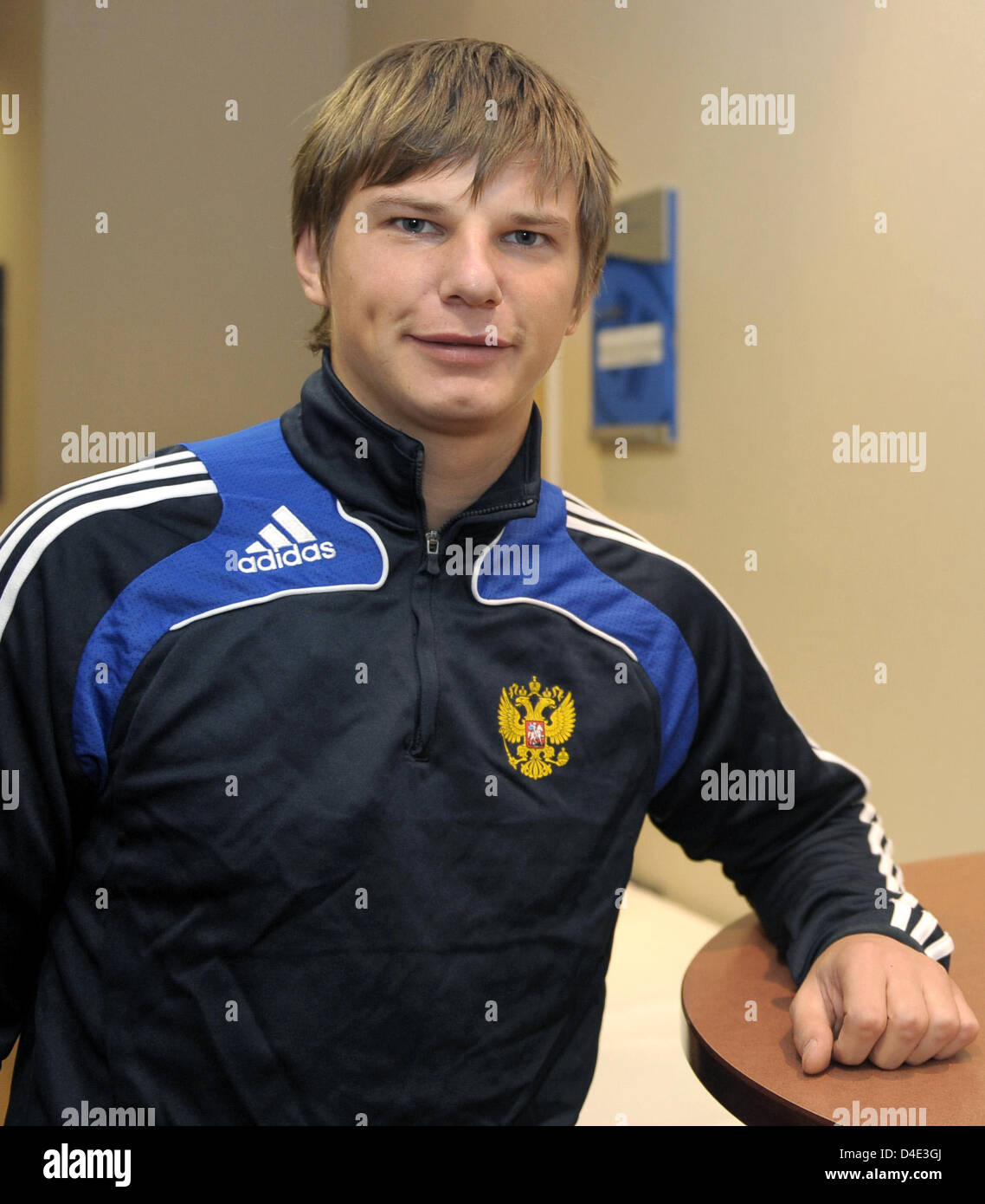 Russian national soccer player Andrei Arshavin smiles at the team hotel