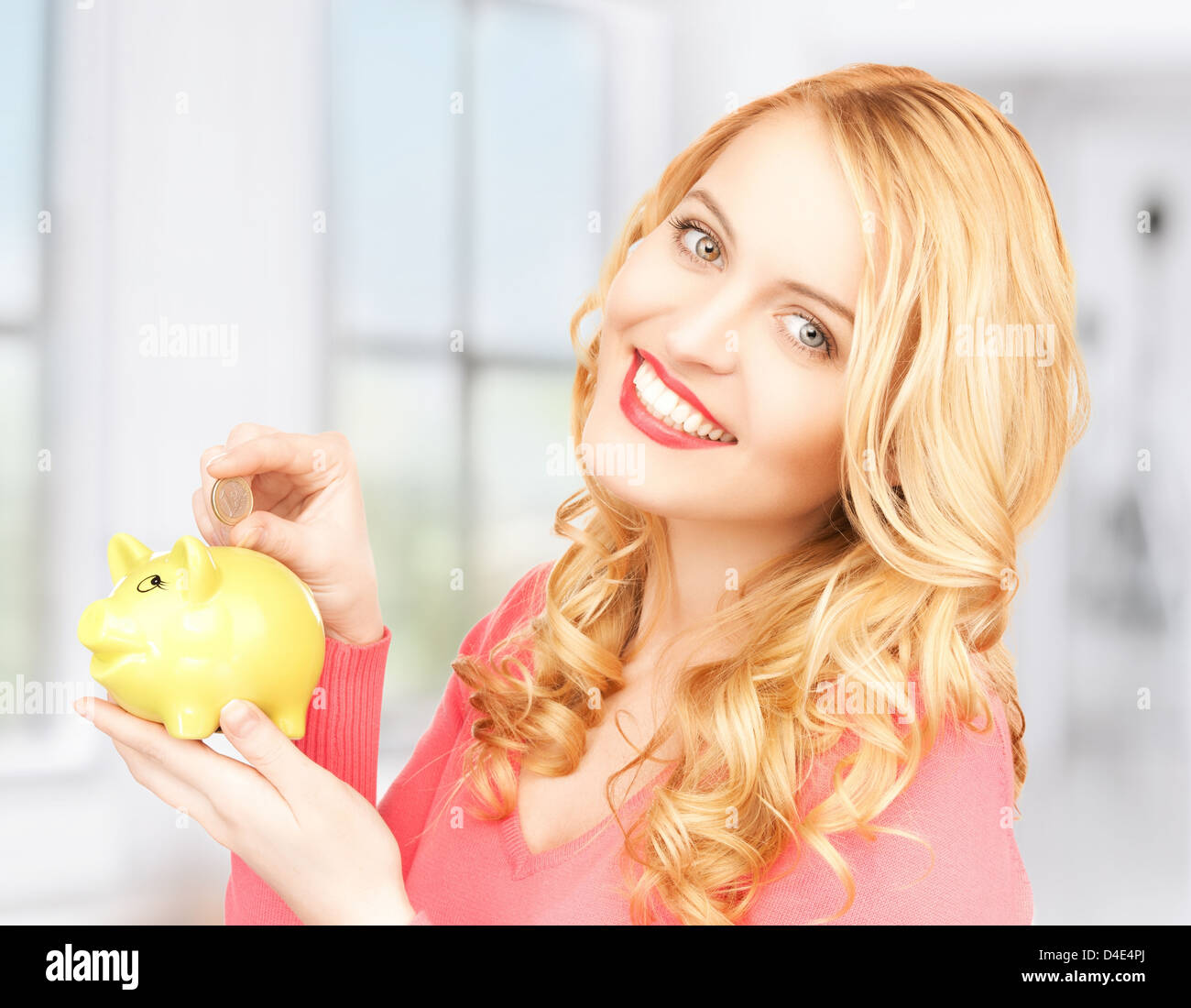 woman with piggy bank and cash money Stock Photo - Alamy