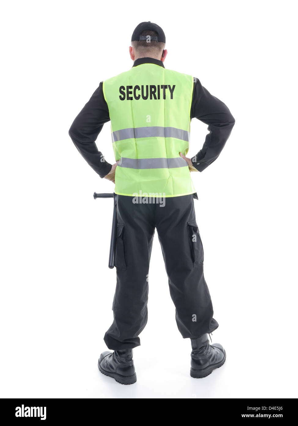 Security man wearing black uniform and yellow reflective vest standing  confidently with arms resting on hips, facing back Stock Photo - Alamy