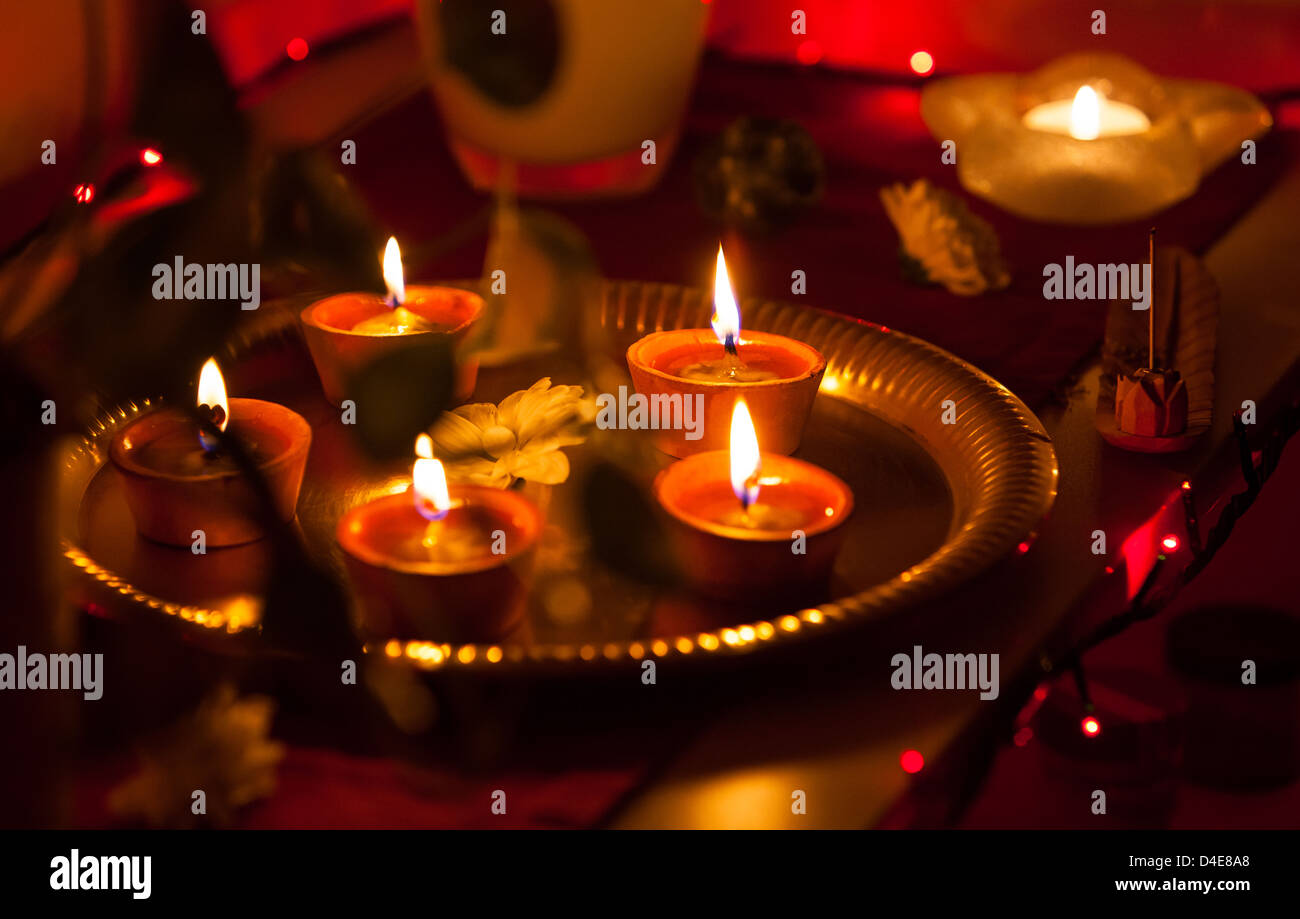 Candles are burning on Diwali festival. Stock Photo