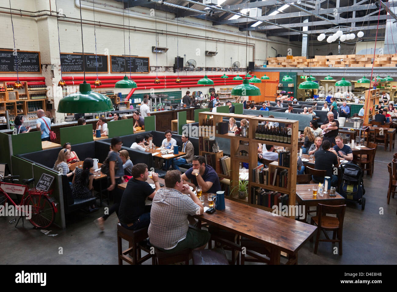 People relaxing at Little Creatures Dining Hall on Brunswick Street. Fitzroy, Melbourne, Victoria, Australia Stock Photo