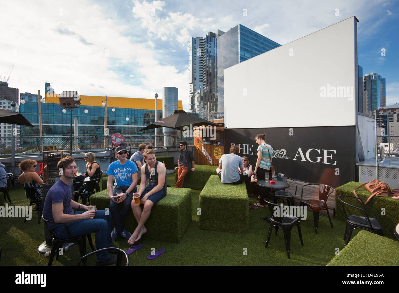 People relaxing at Rooftop Bar at Curtain House. Melbourne, Victoria, Australia Stock Photo