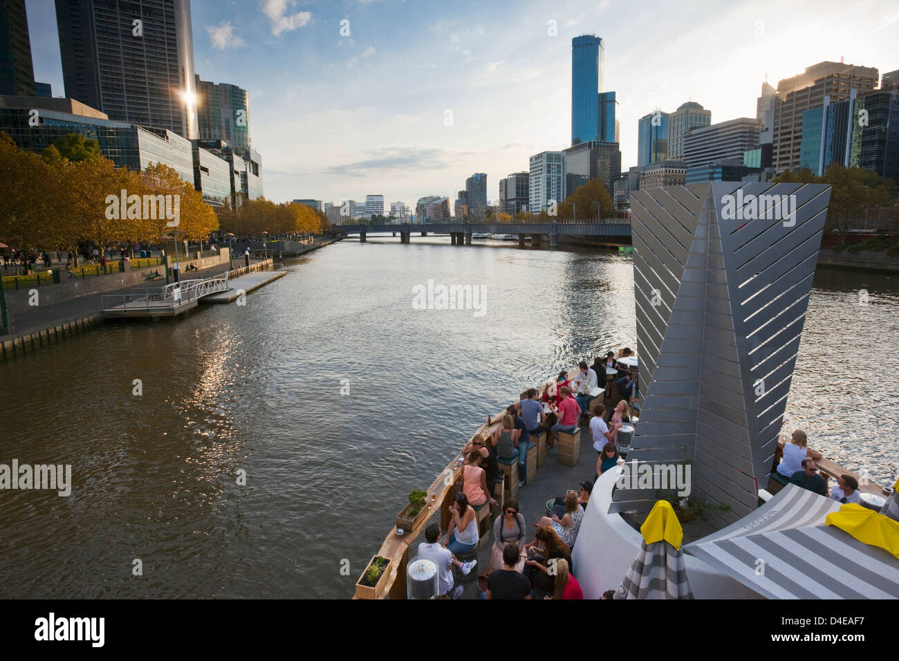 People drinking at Ponyfish Island, on the Yarra River. Melbourne, Victoria, Australia Stock Photo