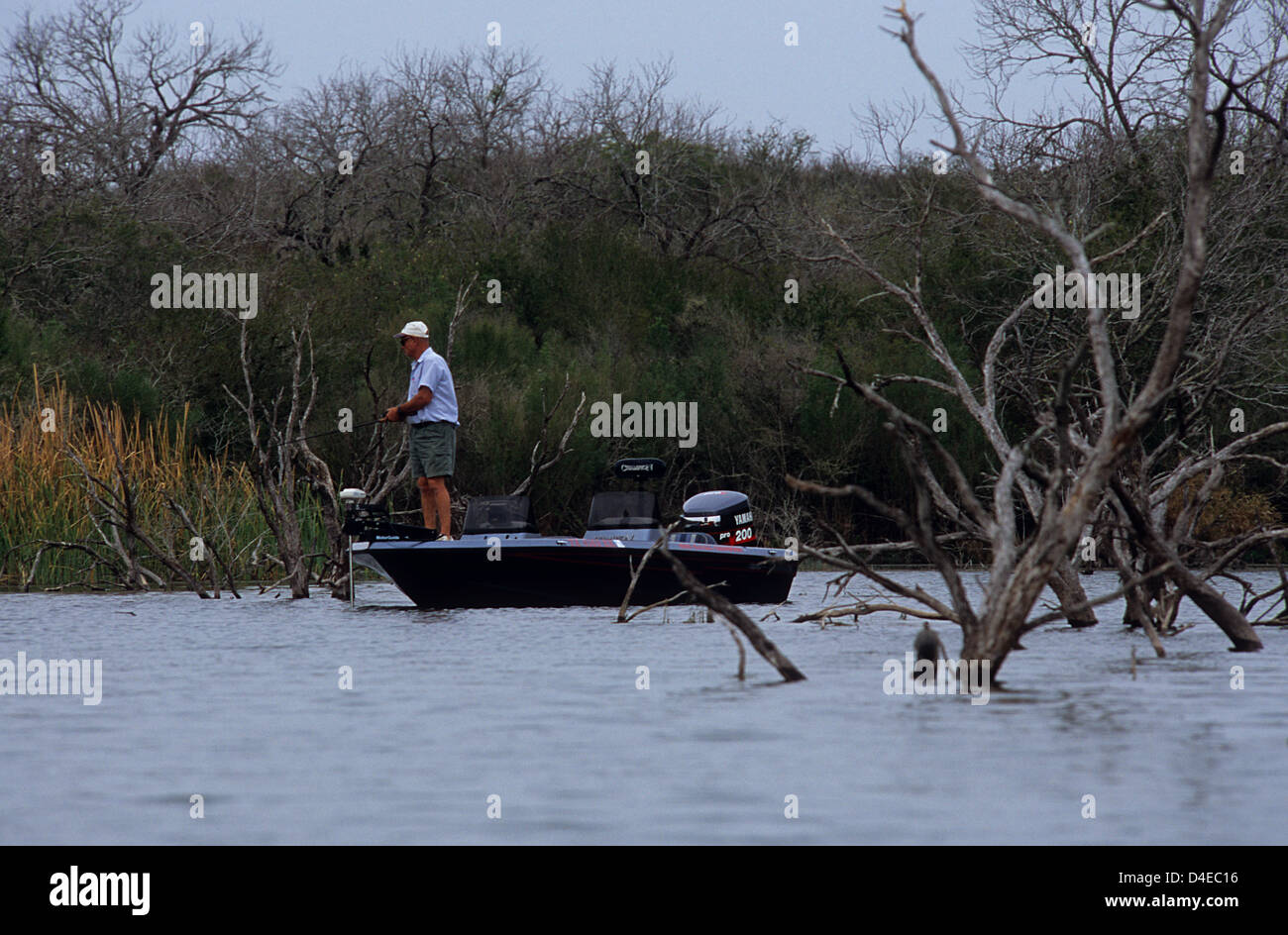 Bass fisherman on Choke Canyon Lake, Tilden Texas Stock Photo