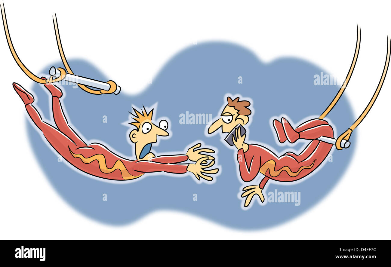 An acrobat scared because his partner is on the phone Stock Photo Alamy