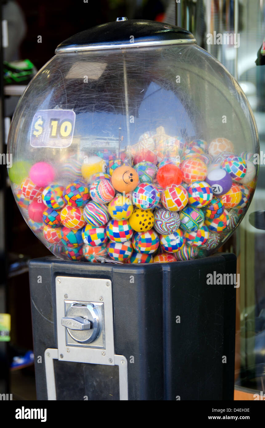 Rubber balls in a gumball vending machine in Oaxaca, Mexico. Stock Photo