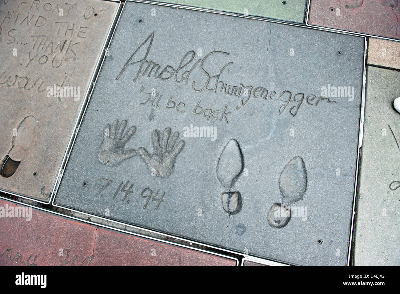 Los Angeles, USA, hand and shoe prints by Arnie front of the Grauman, AEOS Chinese Theatre Stock Photo