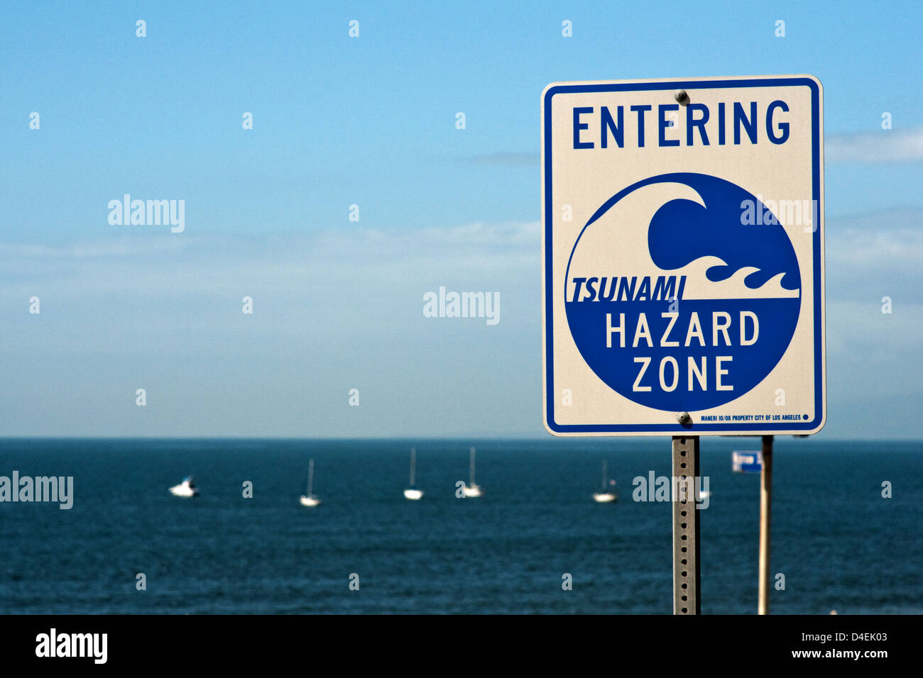 Los Angeles, USA, a tsunami warning sign at the Del Rey Lagoon Beach