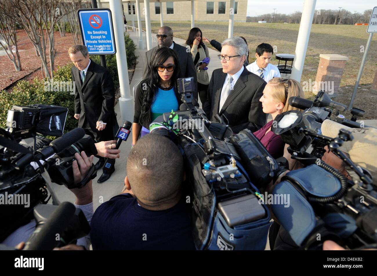 Mckinney, Texas, USA. 12th March 2013. Pilar Sanders, flanked by her