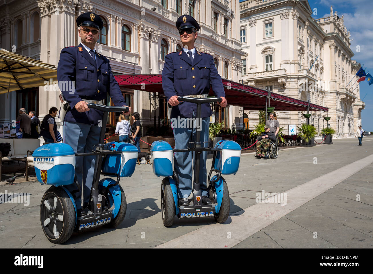 Two Italian policemen on Segways, Trieste, Italy Stock Photo