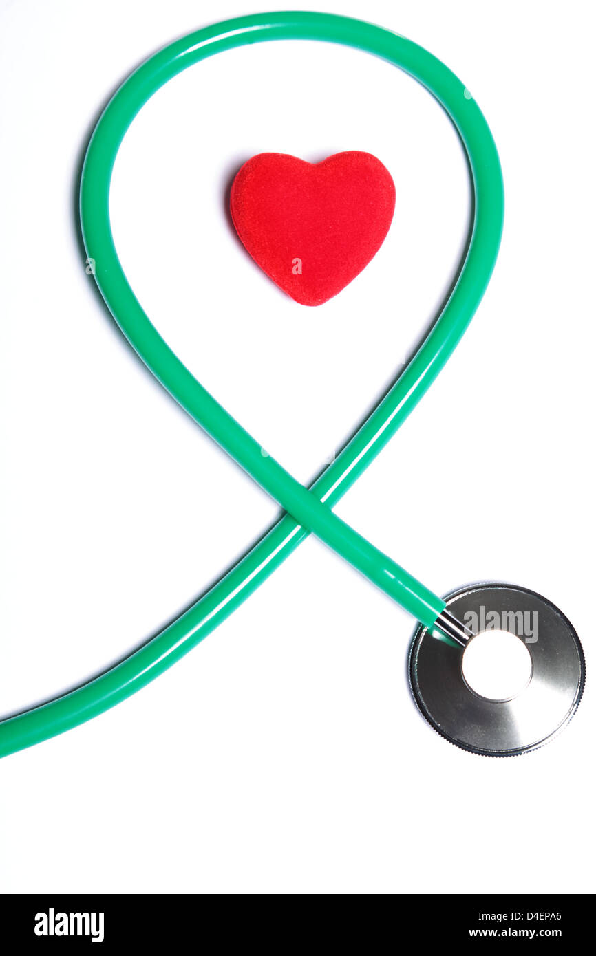 Red heart and a green stethoscope on white background Stock Photo - Alamy