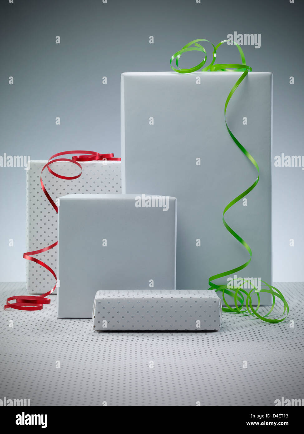 Wrapped presents with ribbons Stock Photo