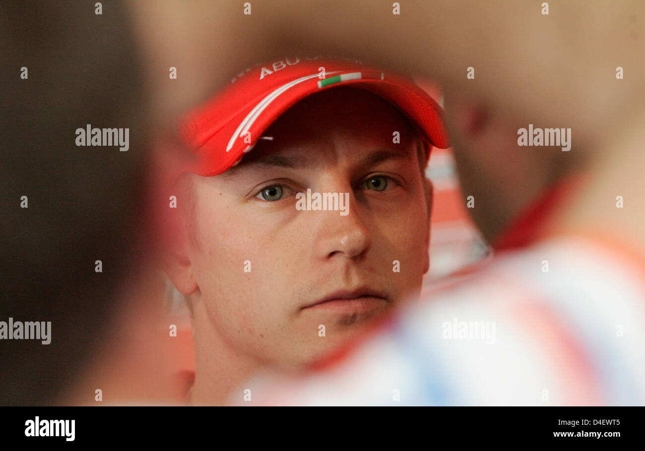 Finnish Formula One driver Kimi Raikkonen of Scuderia Ferrari stands in