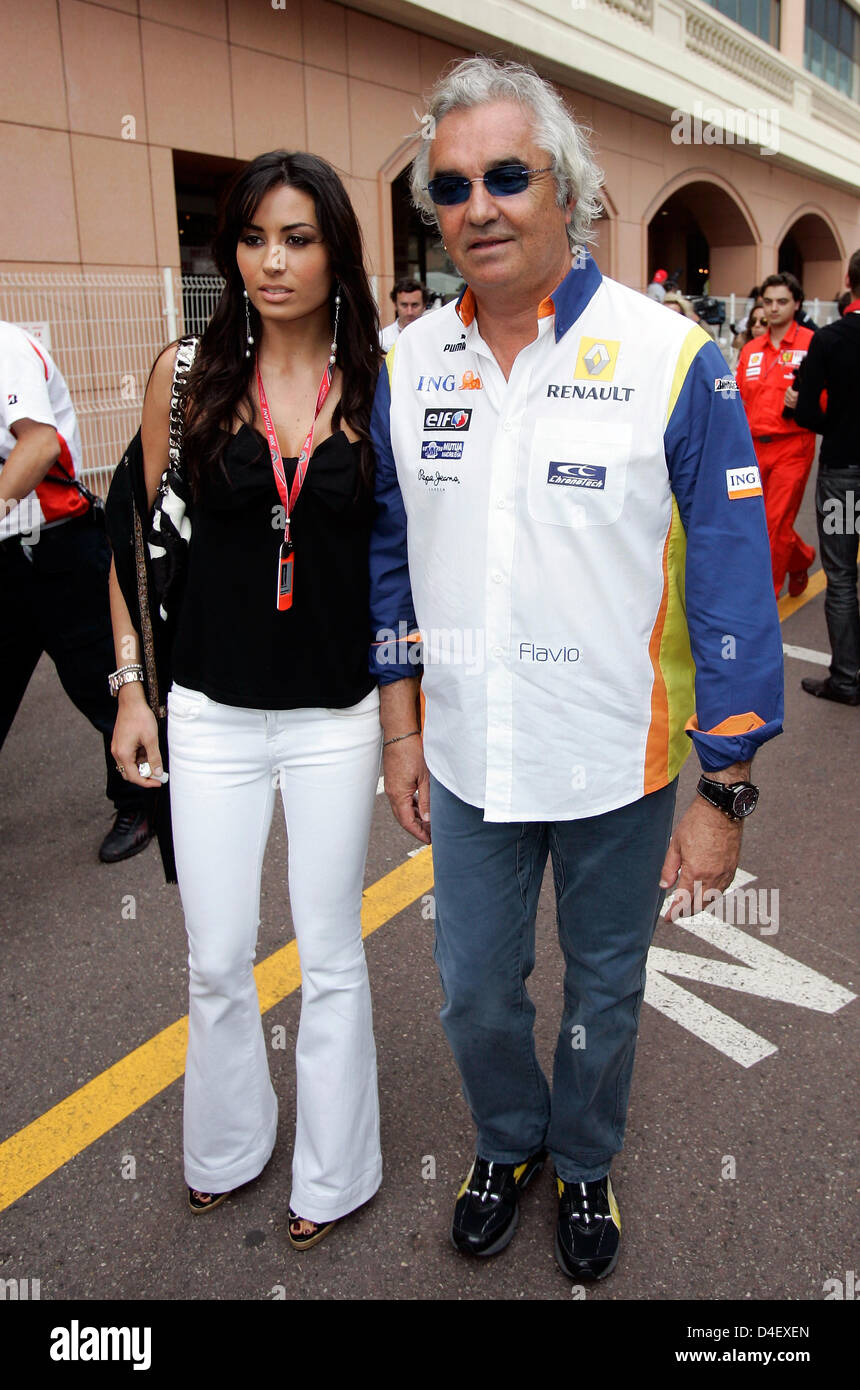 Renault F1 team principal Italian Flavio Briatore (R) and his girlfriend Elisabetta Gregoraci (L) pictured in the paddock of Monte Carlo, Monaco, 24 May 2008. The Formula 1 Grand Prix of Monaco 2008 is held in the principality's streets on 25 May. Photo: FRANK MAY Stock Photo