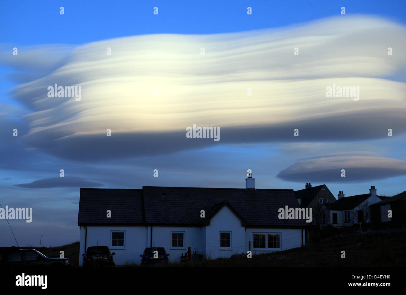 Isle of mull, Scotland, UK. 12th March 2013. Lenticular Clouds, Altocumulus lenticularis, over the village of Fionnphort on the Isle of Mull in the Inner Hebrides of Scotland Credit:  PictureScotland / Alamy Live News Stock Photo