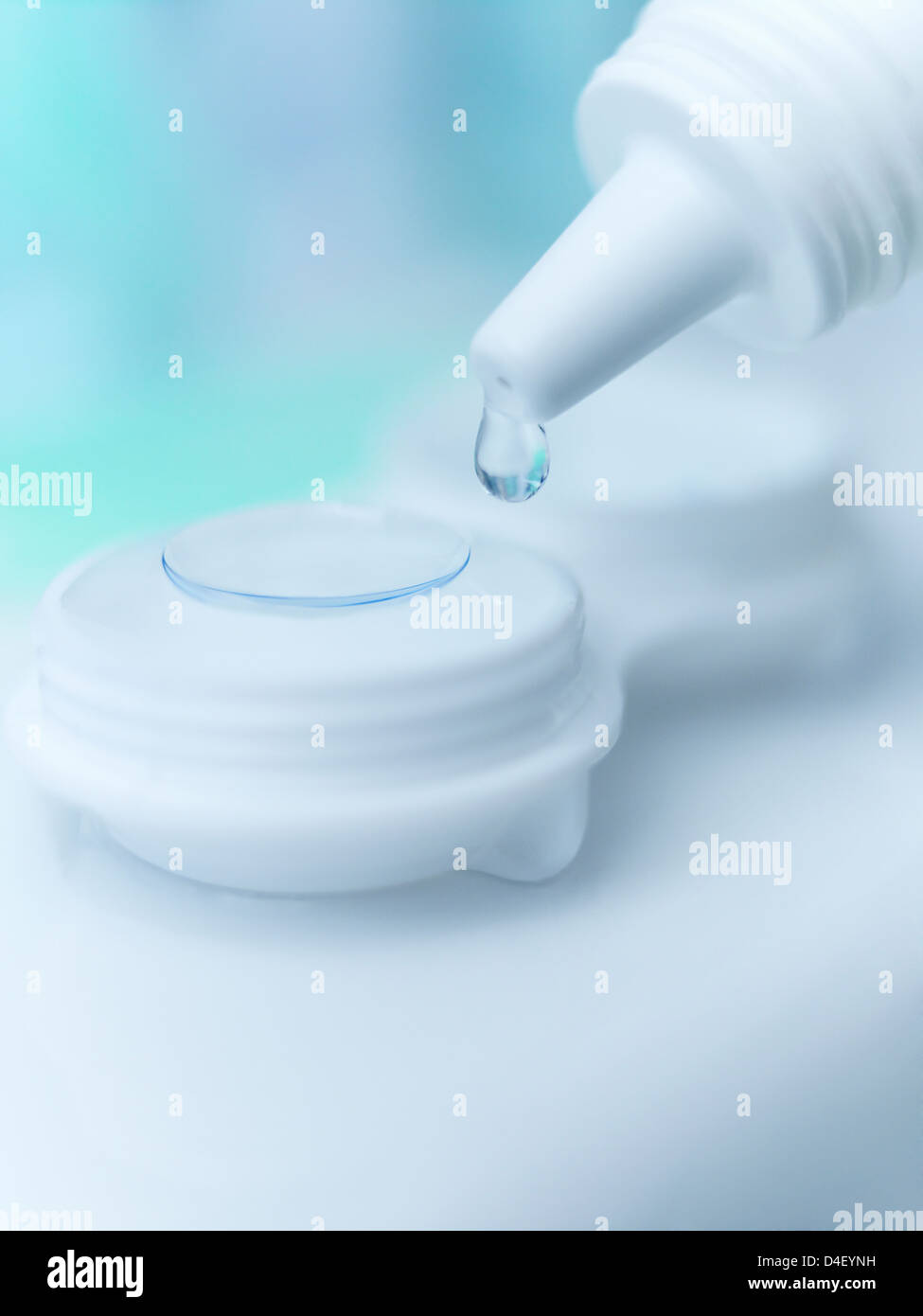 Close up of saline dropping on contact lens Stock Photo