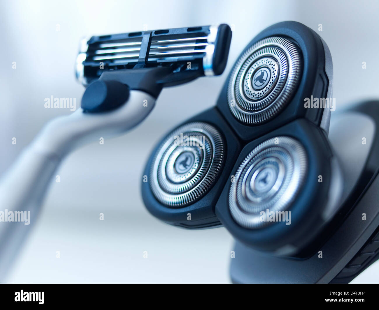 Close up of standard and electric razors Stock Photo - Alamy
