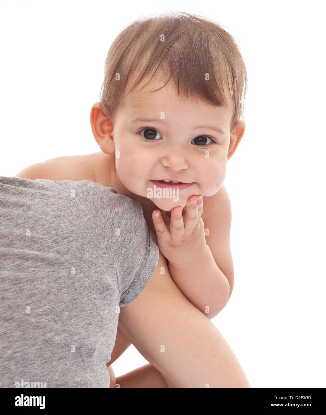 Funny baby girl on mum's hands. Isolated on a white background Stock