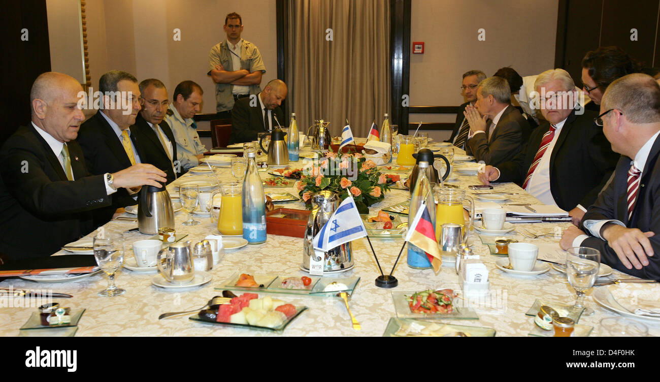 German Foreign Minister Frank-Walter Steinmeier (2-R) and Israel's Defence Minister Ehud Barak (2-L) seen during a breakfast meeting at King David Hotel in Jerusalem, Israel, 2 June 2008. Mr Steinmeier, who is also German Vice Chancellor, had started a diplomatic tour of the Lebanon, Israel and Latvia the day before. Photo: Arno Burgi Stock Photo