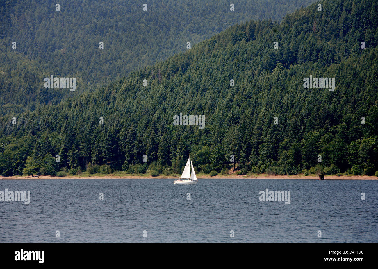 Innerste A sailing boat pictured on the reservoir of Innerste dam at mountain ...