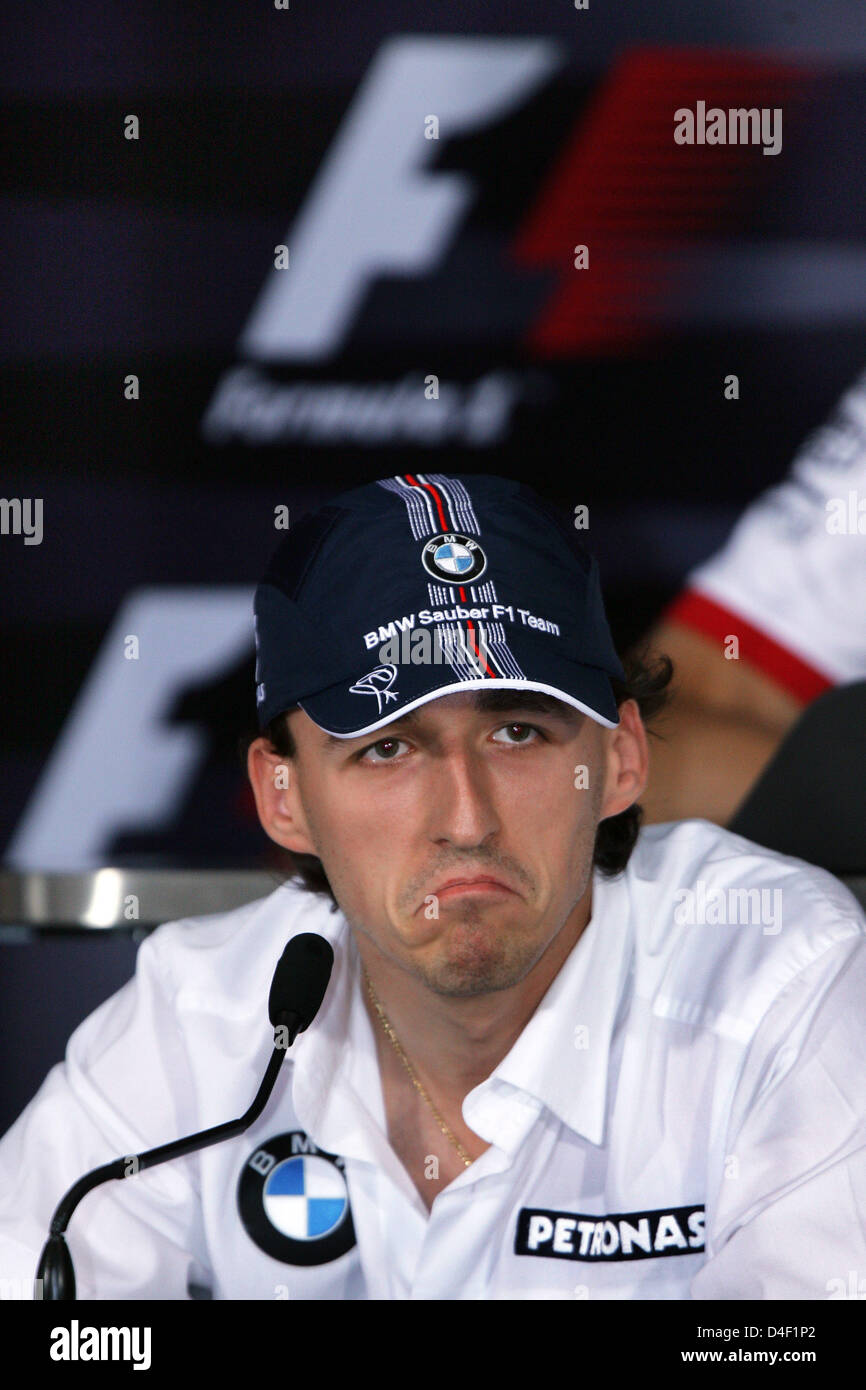 Polish Formula One driver Robert Kubica of BMW Sauber grimaces during a