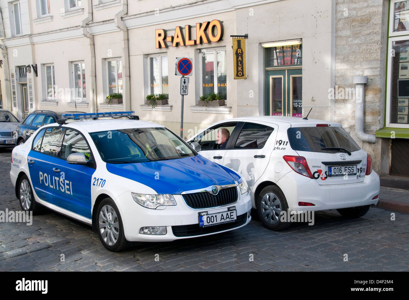 An Estonian Police car and a Group 4 Security car in Tallinn, Estonia