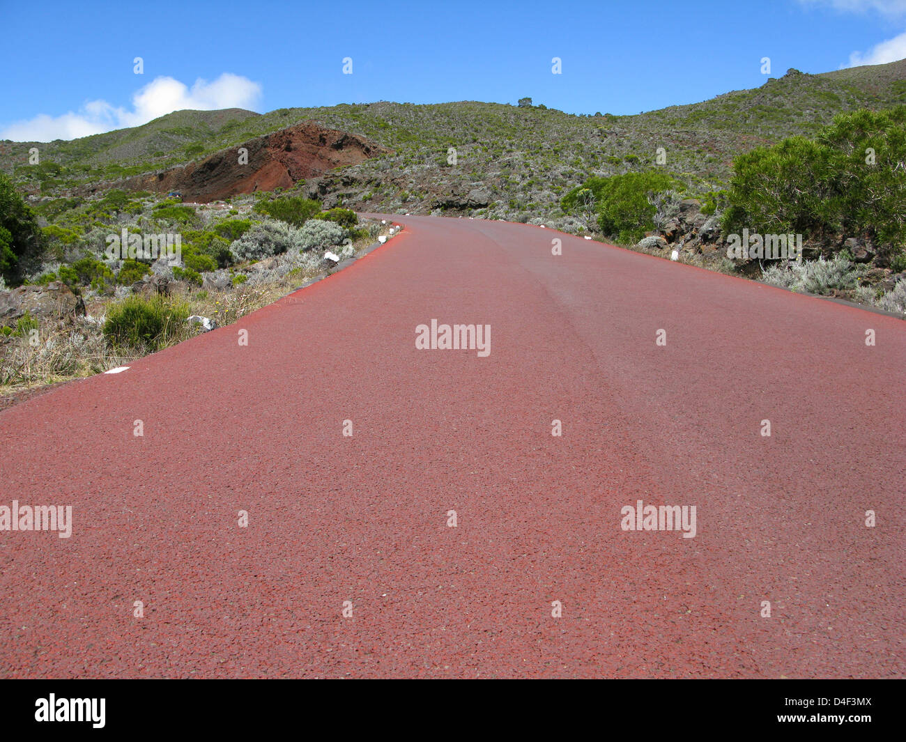 A red street captured in the Piton de la Fournaise national park on
