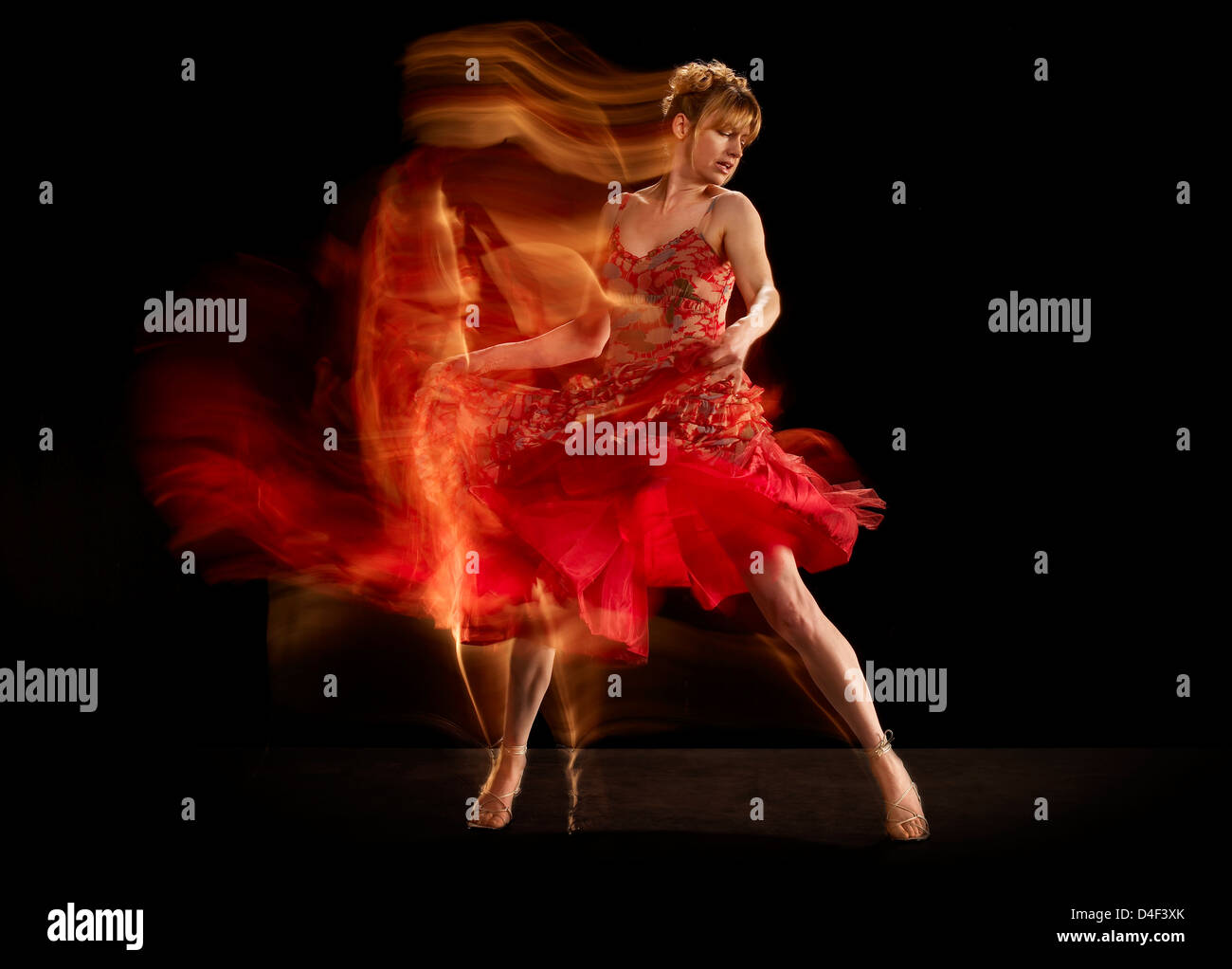 Time lapse view of dancer twirling Stock Photo