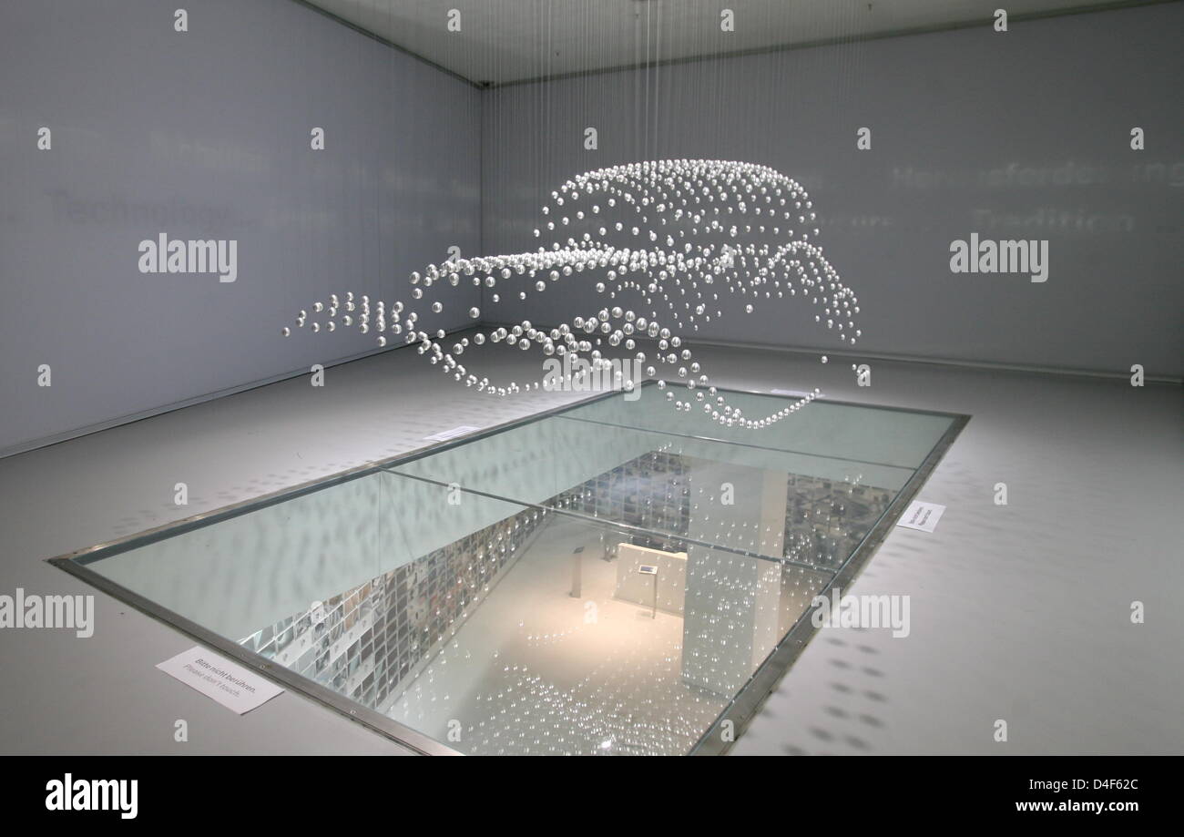 The picture shows a car sculpture out of balls in the BMW