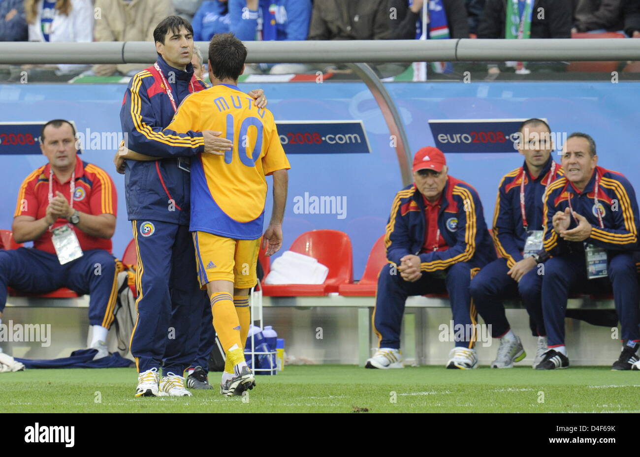 Adrian Mutu of Romania is substituted by coach Victor Piturca during the UEFA EURO 2008 Group C preliminary round match between Italy and Romania at the Letzigrund stadium in Zurich, Switzerland, 13