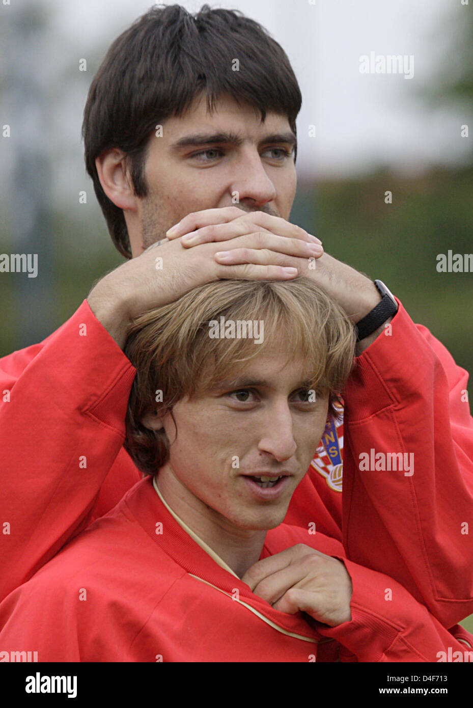 Vedran Corluka and Luka Modric (front) joke during the Croatian training session in Oberwart , Austria on 13 June 2008. Croatia will play Poland in their third Euro 2008 Group B match in Klagenfurt, Austria on 16 June 2008. Photo: Achim Scheidemann dpa +++###dpa###+++ Stock Photo