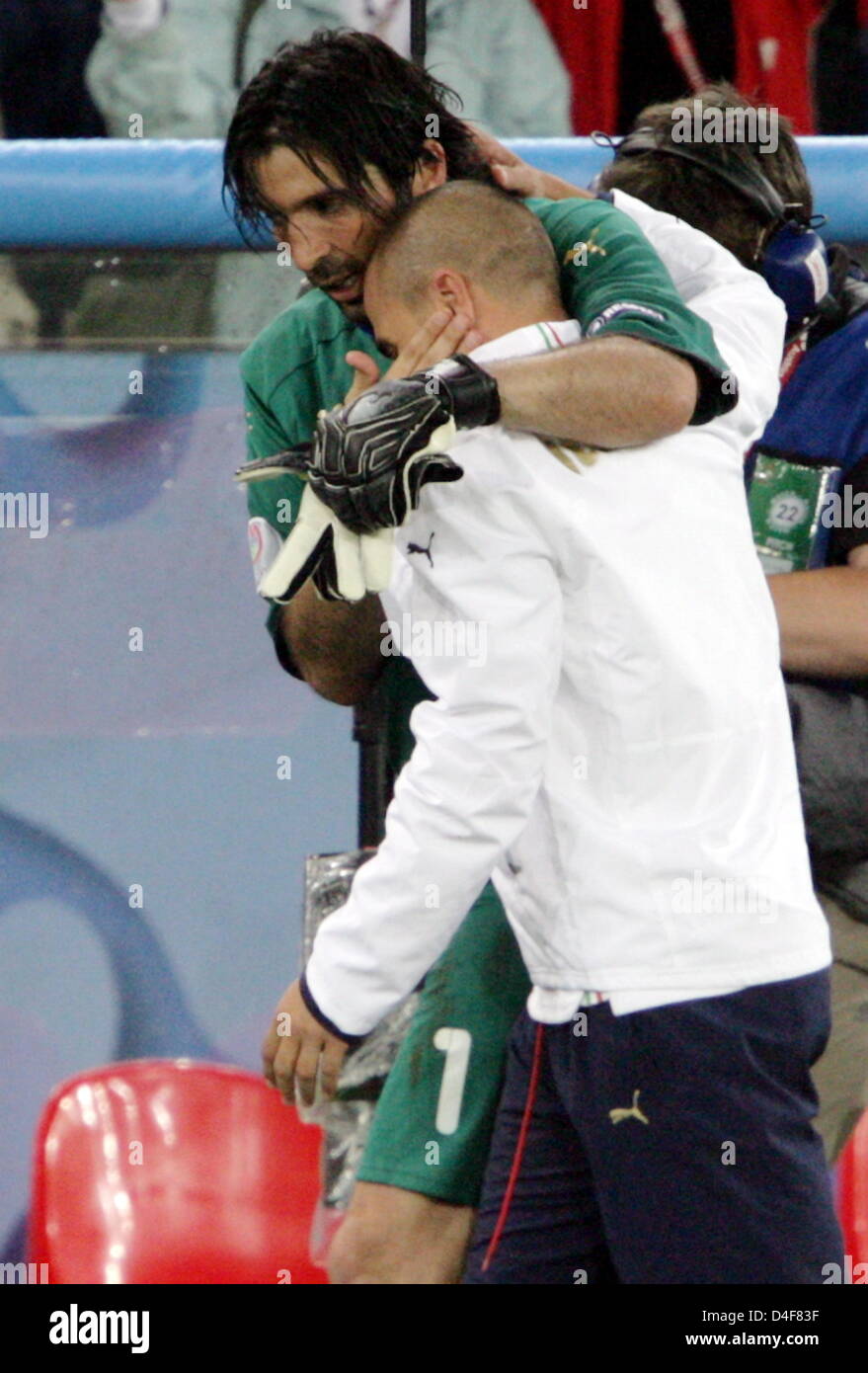 Gianluigi Buffon (L) of Italy jubilates with injured Fabio Cannavaro ...