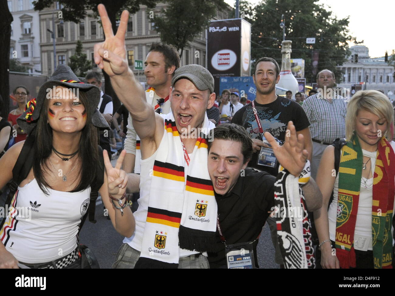 German supporters celebrating the 2-0-lead in the fanzone in Vienna, Austria on 19 June 2008, during the EURO 2008 quarter final match Portugal versus Germany. Photo: Achim Scheidemann dpa +++###dpa###+++ Stock Photo